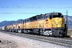 Union Pacific WB with DD35A #78. Large!cement pickup from Victorville area on head end.